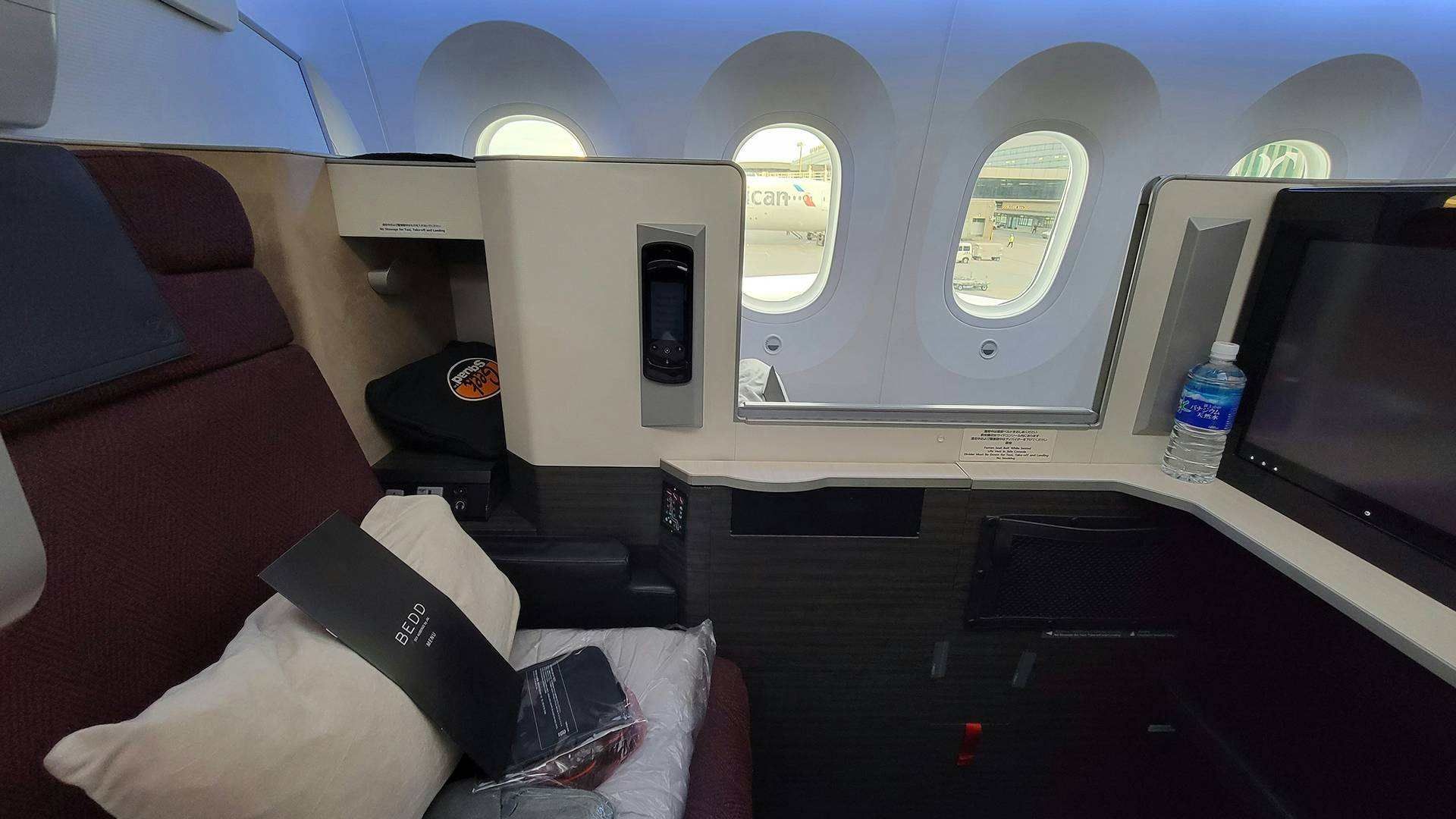 Japan Airlines aircraft flying business class to Tokyo from the USA